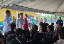KJRI Kuching Jemput Bola Layani 225 PMI di Perkebunan Sawit Mukah