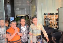 Bupati Bolaang Mongondow Utara Kenakan Rompi Oranye KPK
