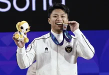 KONI Pusat Marciano Apresiasi Rahmat Erwin Raih Emas dan Rekor Dunia di Asian Games