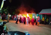 Bhabinkamtibmas Polsek Bunguran Barat Amankan Pawai Obor Idul Fitri di Pulau Tiga