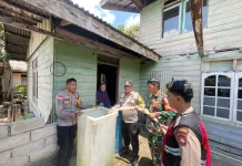Polres Natuna Salurkan Air Bersih di Pengadah