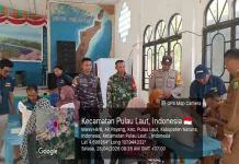 Babinsa Desa Air Payamg Dampingi Penyaluran Bantuan Pangan