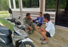 Babinsa Tanjung Batang Ingatkan Warga Utamakan Keselamatan saat Beraktifitas