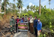 Babinsa dan Polisi Patroli Karhutla