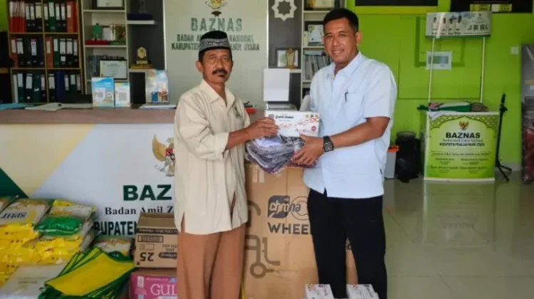 Satpolairud Polres PPU Gandeng BAZNAS Salurkan Bansos