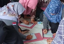 Peringati Nuzulul Quran, Ratusan Guru Sungai Pinang Tulis Ulang 30 Juz Al-Qur’an