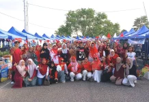 Sambut HUT RI, Komunitas KGS Pasang Bendera dan Kenakan Baju Merah Putih