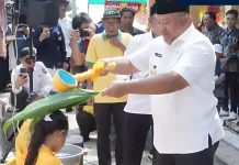 Tradisi Buang Naas Warnai Hari Jadi Kampung Talisayan