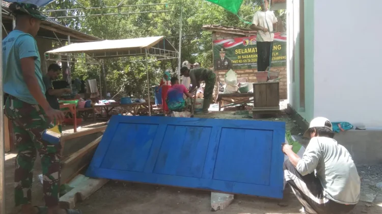 TMMD Beri Sentuhan Tahap Pengecatan Rehab Rutilahu Pak Hasan
