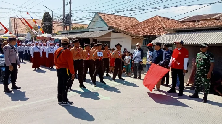 Polsek Sreseh Amankan Jalur Lomba Gerak Jalan
