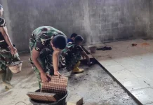 Satgas TMMD Bangkalan Tuntaskan Pemasangan Keramik SD Durin