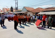 Polsek Sreseh Amankan Jalur Lomba Gerak Jalan