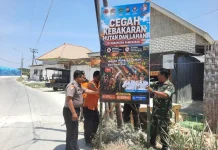 Cegah Kebakaran Lahan, TNI-Polri Pasang Banner Imbauan di Pamekasan
