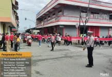 Sat Lantas Polres Kepulauan Tanimbar Kawal Longmars Mahasiswa