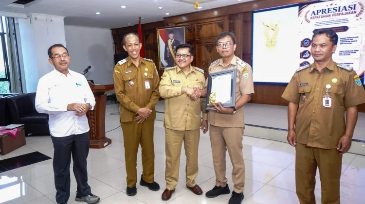Pengelolaan Keuangan, Robby Tekankan Kepatuhan Pajak dan Digitalisasi KKPD