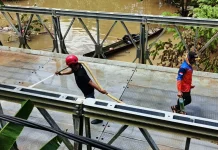 BPBD Mahulu Bersihkan Fasilitas Umum Pascabanjir di Ujoh Bilang