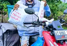 Aktivitas di tengah Kabut Asap, Kurir Keluhkan Gangguan Pernapasan