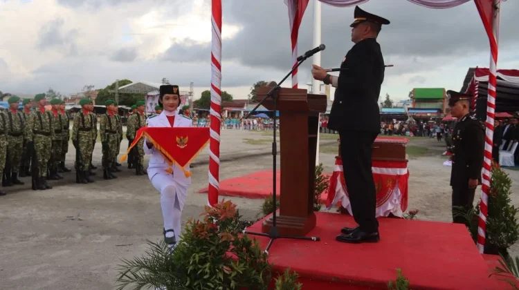 Kapolres Humbahas Pimpin Upacara Penurunan Bendera Merah Putih