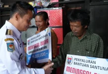 Bupati Humbahas Serahkan Bantuan Korban Bencana Alam Air Sungai Meluap di Pollung