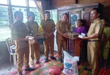 Pemkab Humbahas Salurkan Bantuan Sosial kepada Korban Kebakaran di Paranginan