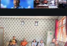 Pemkab Taput Presentasi Monev SAQ Komisi Informasi Provsu