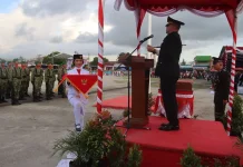 Kapolres Humbahas Pimpin Upacara Penurunan Bendera Merah Putih