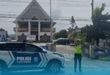 Polres Toba Atur Lalu Lintas Depan Gereja Libur Minggu