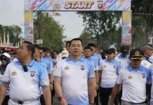 Bupati Kapuas Hulu Mengikuti Jalan Sehat Memperingati HUT Bhayangkara ke-80