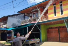 Sinergi Polsek Sokan Bersama Masyarakat Muara Tanjung Cegah Kebakaran Bangunan