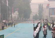 Apel ditengah Kabut Asap, Personel Polres Sekadau Kenakan Masker