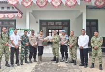 Semarak HUT TNI, Polsek Nanga Pinoh Sambangi Koramil Perkuat Sinergitas TNI-Polri