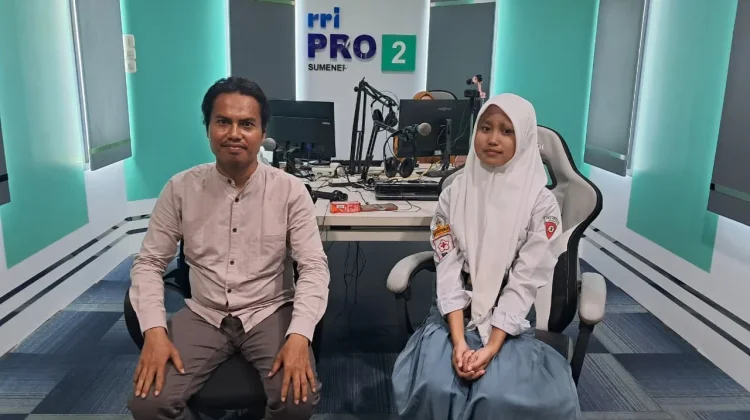 Bela, Raih Juara Jurnalistik FLS3N