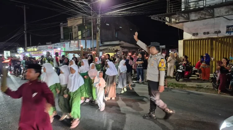Polsek Taman Sari Kerahkan Personel Amankan Pawai Obor