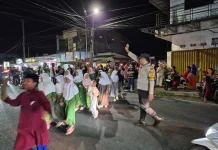 Polsek Taman Sari Kerahkan Personel Amankan Pawai Obor