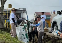 Bupati Monadi Pimpin Gotong Royong di Kayu Aro