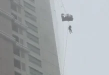 Hujan Deras, Pembersih Kaca Tergantung di Apartemen