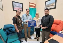 TASPEN KC Kediri Serahkan Manfaat THT dan JKK kepada Ahli Waris Kepala BPS Sidoarjo