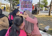 Face Painting Jadi Tren Baru Meriahkan Alun-Alun Pacitan
