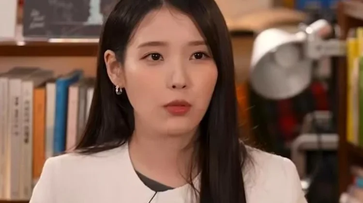 Bikin Penggemar Syok! IU Batalkan Konser dan Tunda Album Baru. Ini Penyebabnya!