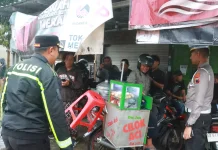 Ditengah Hujan, Kapolres Pimpin Pengamanan Doa Bersama Eks Karyawan Sritex