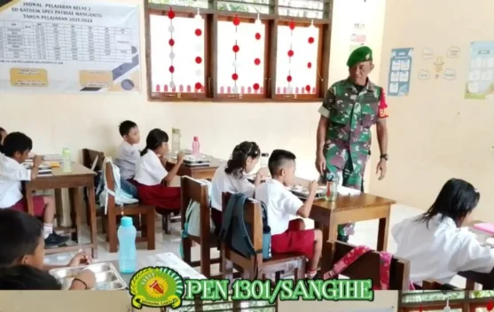 Babinsa Manganitu Kawal Program Makan Bergizi bagi Siswa