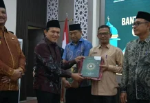 Wagub Aceh Salurkan 50.000 Al-Qur’an Bantuan Kerajaan Arab Saudi