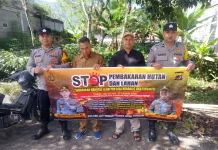 Personel Polres Aceh Tengah Pasang Spanduk Imbauan Cegah Karhutlah