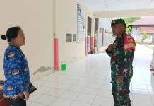 Babinsa Melonguane Awasi Pembangunan Rumah Makan Bergizi Siswa