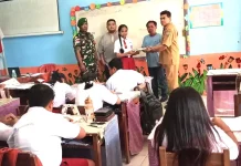Babinsa Rainis Beri Pendampingan Penyaluran MBG