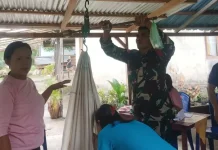 Babinsa Koramil Beo Dampingi Kegiatan Posyandu Tarohan