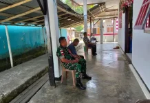 Babinsa Hadir dalam Ibadah Minggu di Desa Binaan