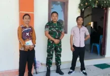 Babinsa Karatung Amankan Ibadah Minggu