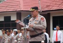 Diguyur Hujan, Upacara Polres Lingga Tetap Tegak
