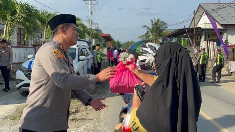 Polres Haltim dan Bhayangkari Berbagi Takjil di Maba